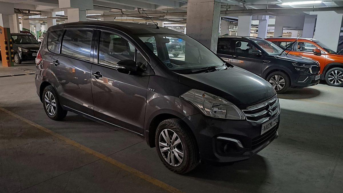 A Maruti Suzuki Ertiga, the six-seat MPV class used for family bookings